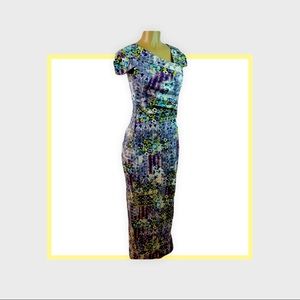 Vintage dress - interesting pattern in blues florals and white. unique cut.